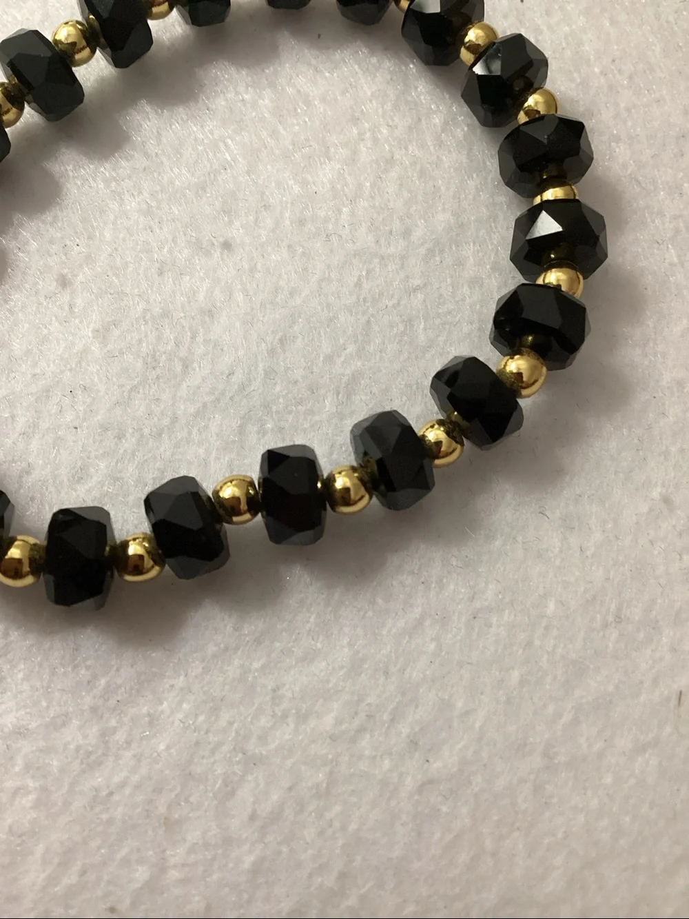 Macy’s Black Crystal and 14K Gold Plated Ball Stretch Bracelet